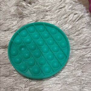 Teal Round Pop glow in the dark pop It Fidget Toy